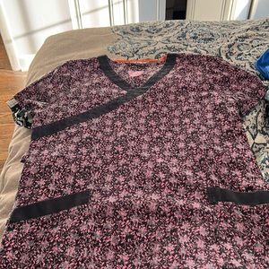Black, grey and pink scrub top with drawstring with and two pockets